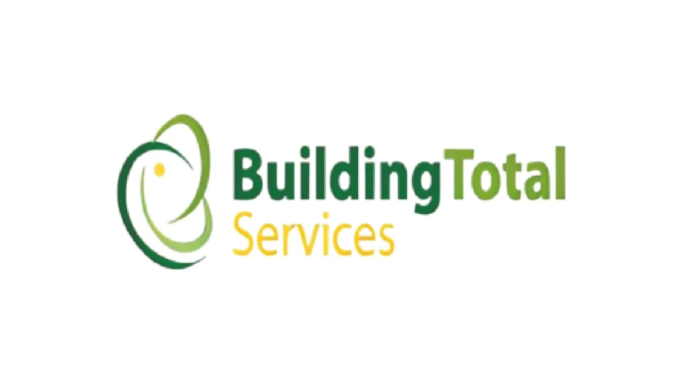 Logotipo anterior de Building Total Services: trazo orgánico verde y amarillo